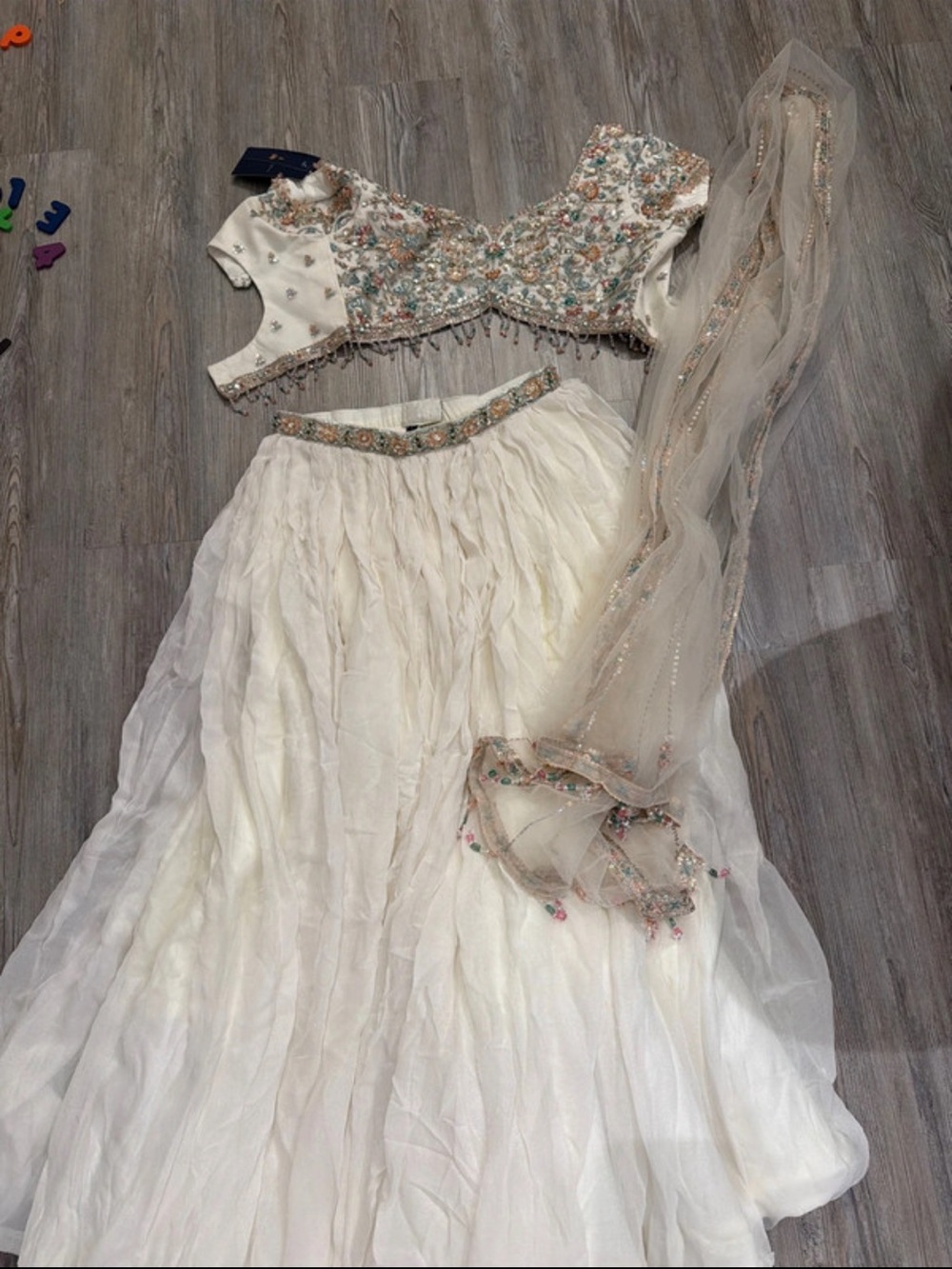Ivory Embroidered A-Line Lehenga Set with Pastel Accents